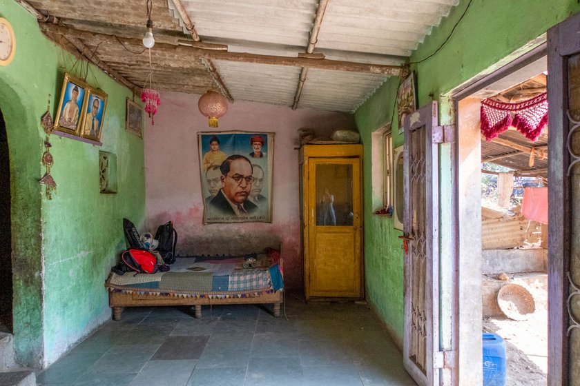 Left: A poster featuring Dr. Ambedkar in Kusumtai's home in Nandgaon. Right: Her granddaughters (second and fourth from left) with other children from the neighbourhood. 'We tell the children the life story of Babasaheb', says Kusumtai

