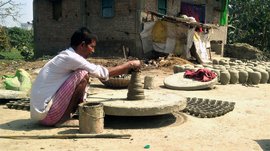 Firing the last of the pots in Rasulpur Sohawan