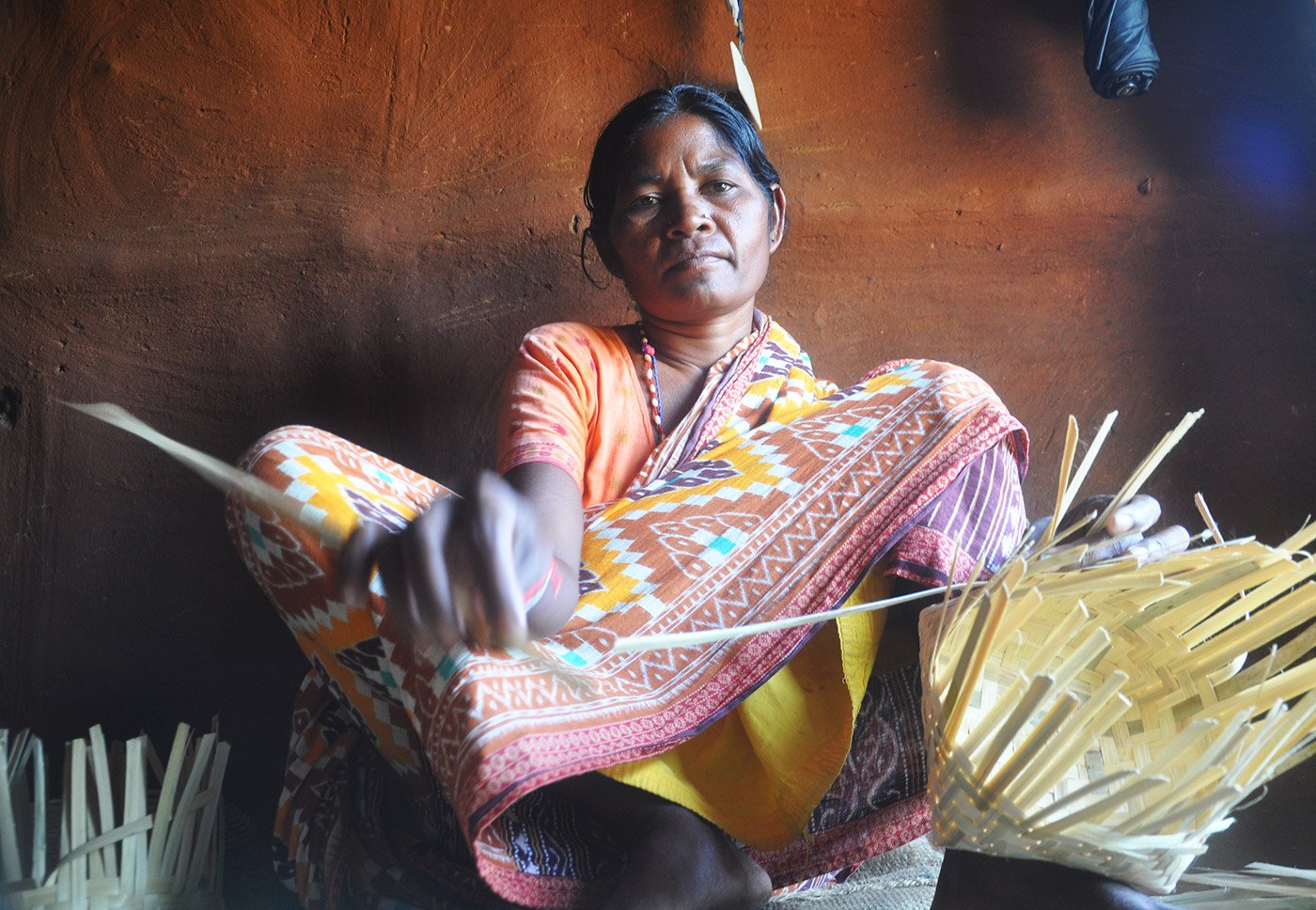 Kamla Paharia weaving baskets