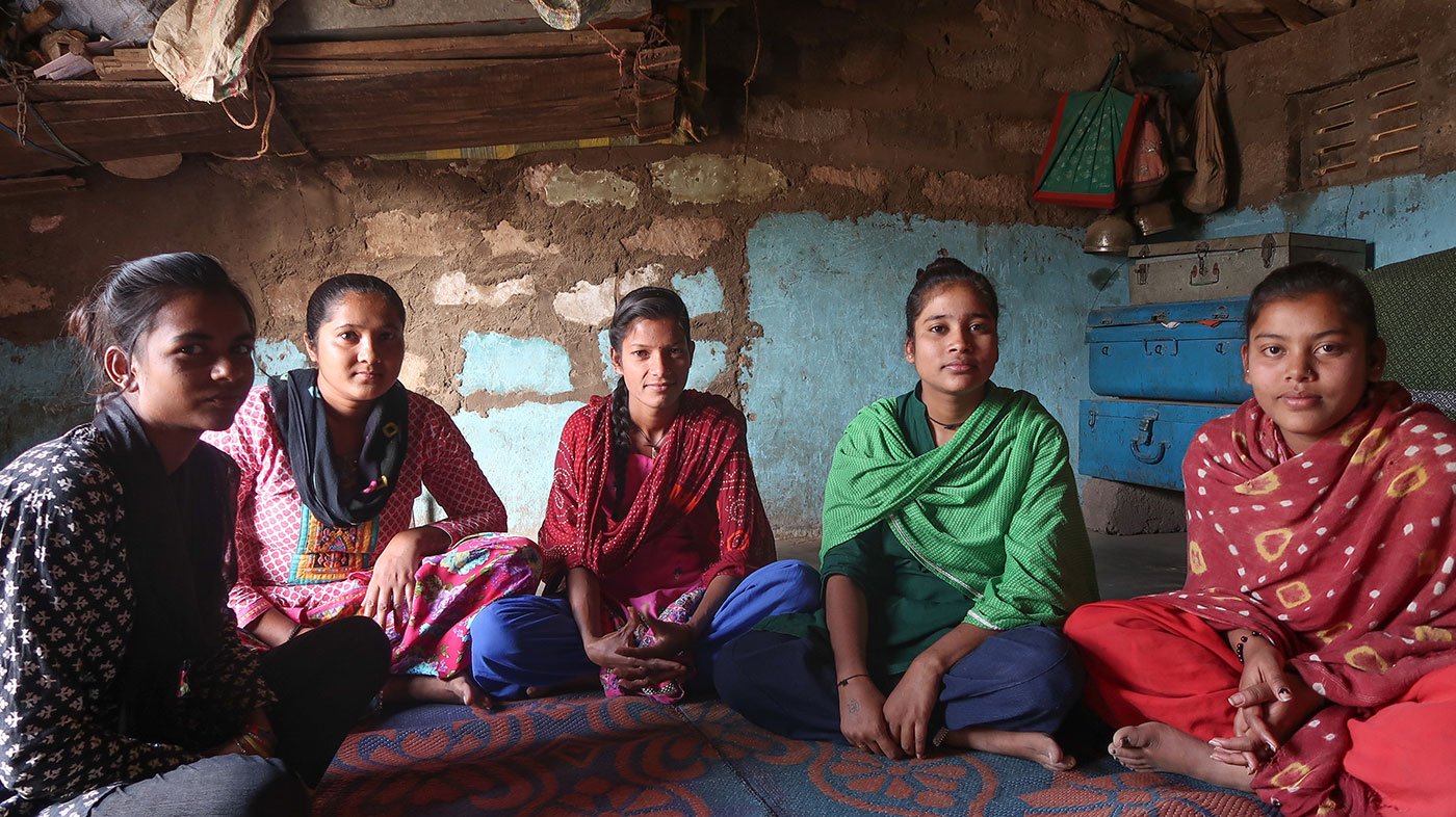 Young women sitting in a house speak of their hopes and doubts about elections