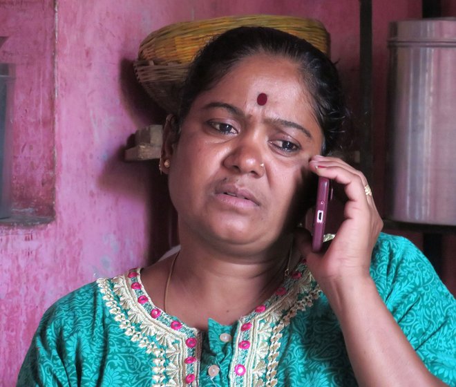 Sunita listening to a case over the phone