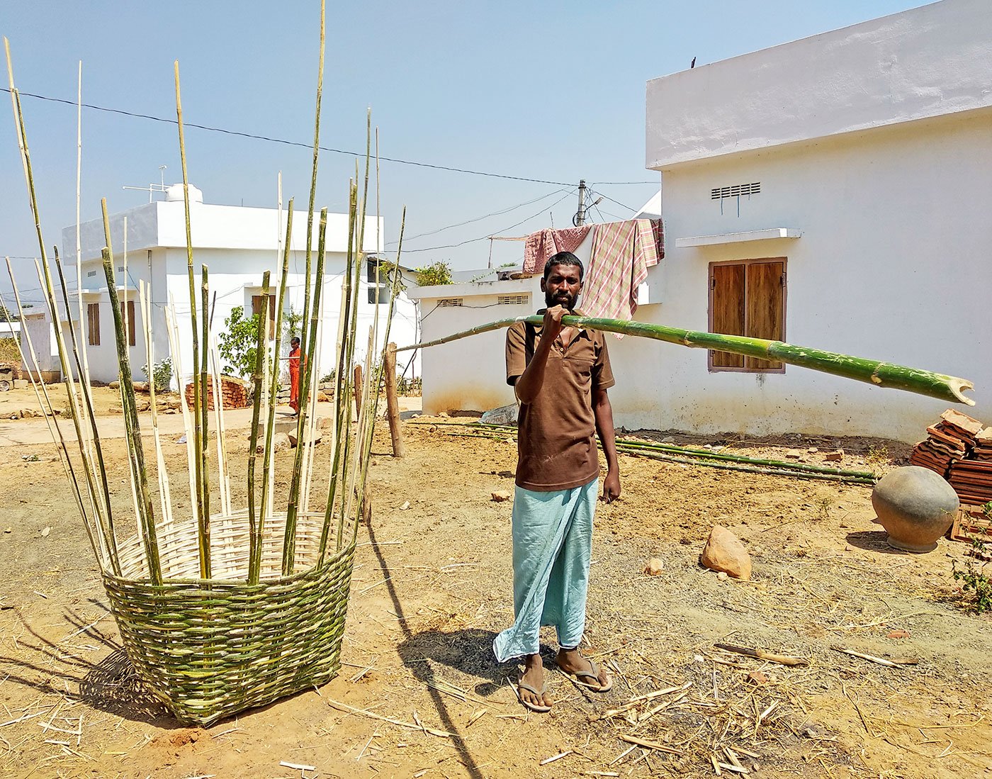 Praveen Kumar works as an agricultural labourer. He goes to the nearby forests and pick up bamboo sticks and make baskets. He takes three days to make one such basket – one day for getting the bamboo from the forests and two for making the basket. He needs three bamboo sticks, of the size he is holding, to make one basket