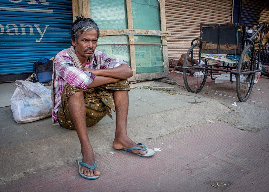 A migrant labourer with no work on a Sunday