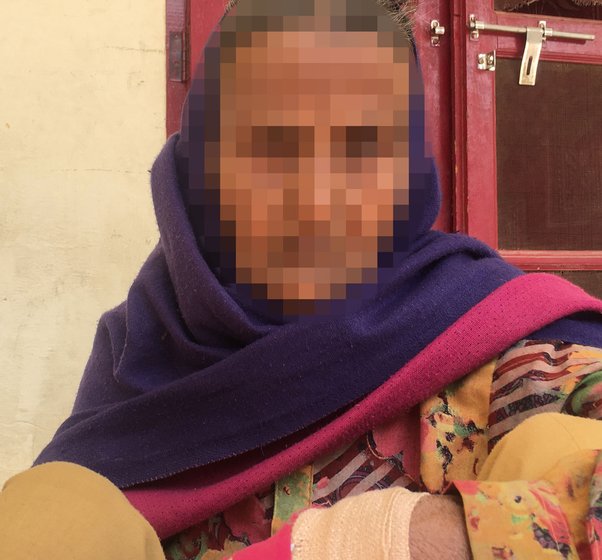Aarifa: 'Using a contraceptive is considered a crime'; she had sprained her hand when we met. Right: The one-room house where she lives alone in Biwan

