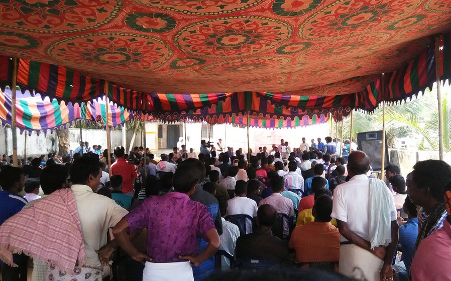 Government officials conducting public hearing in December 2016 which witnessed widespread protests by the villagers