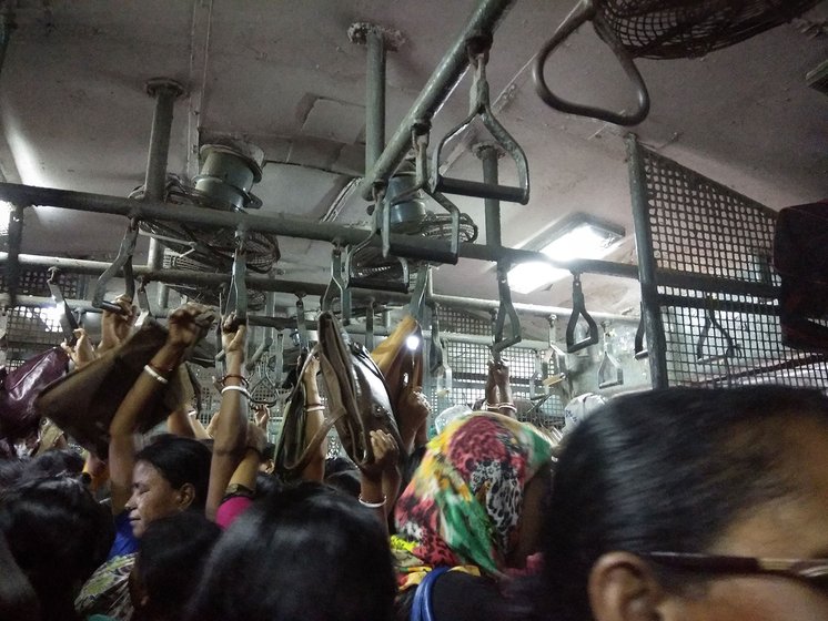 Breshpati Sardar and other women workers on a crowded train from Sealdah to Canning, via Jadavpur