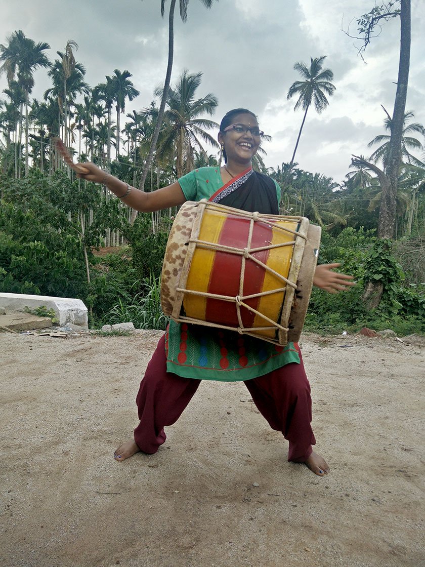 Narsamma playing the dollu kunitha