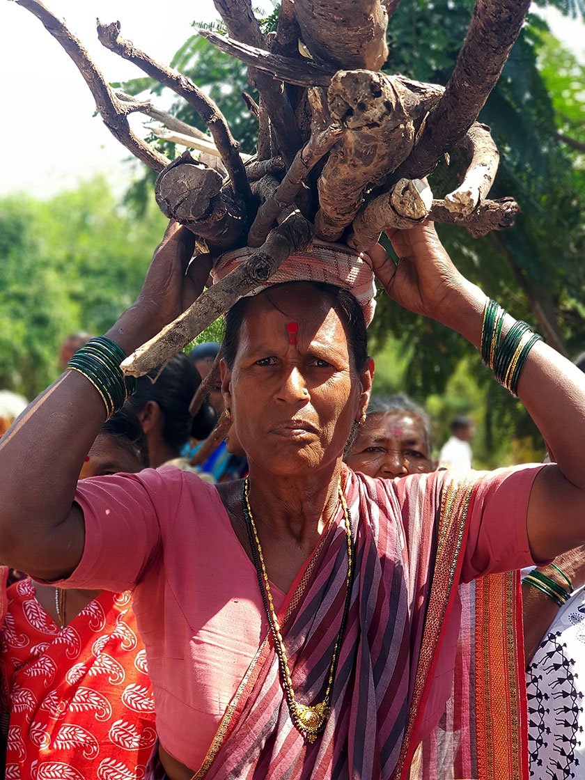 Manubai Gawari with firewood on her head