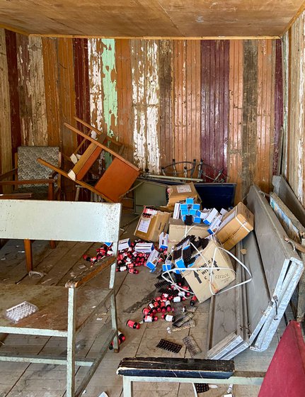 Lake residents can’t recall seeing a doctor at the primary health centre (NTPHC) for two years; an adjacent shed has some medical supplies and discarded furniture