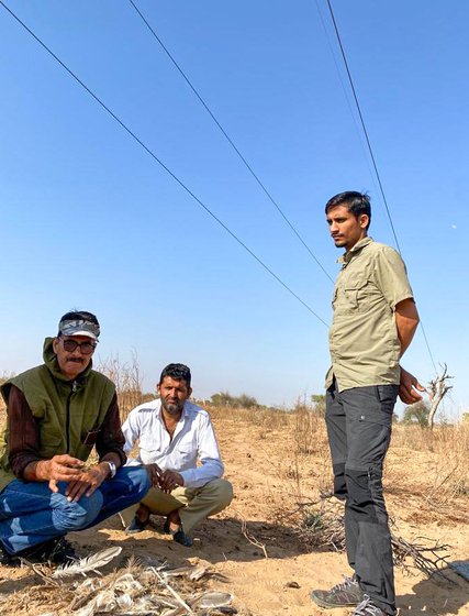 Right: Radheshyam (standing) and local Mangilal watch Dr. S. S. Rathode, WII veterinarian (wearing a cap) examine the feathers