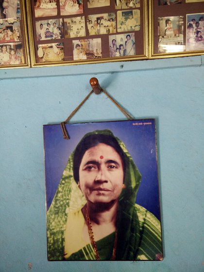 A photo of tamasha empress Vithabai Narayangaonkar, Mangala Bansode’s mother, hangs in Mangala tai’s house in Karawdi village, Karad taluka, Satara district  