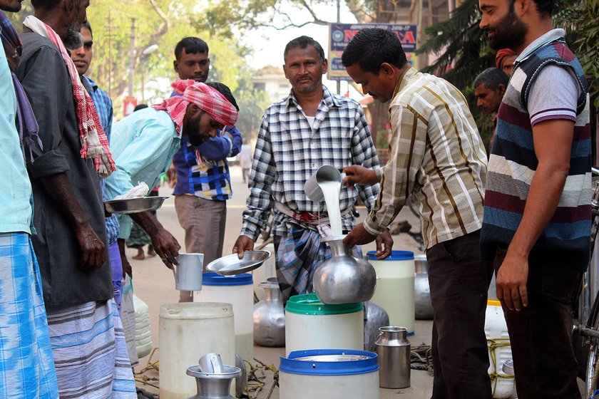 Milk producers of char selling milk at Dhubri town