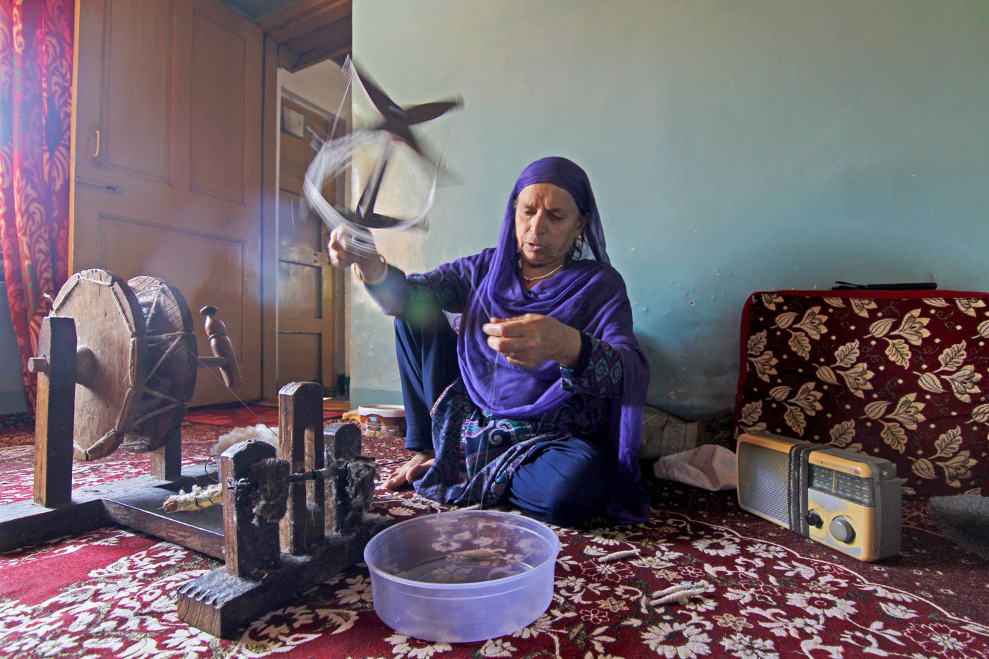 Fahmeeda's mother-in-law, Khatija combines two threads together to make it more durable