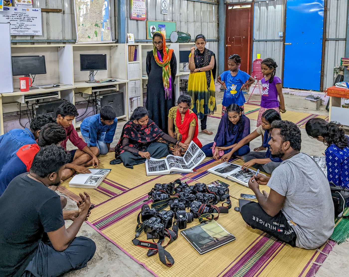 M. Palani Kumar taking a photography class with students of Dr. Ambedkar Pagutharivu Padasalai in Vyasarpadi, Chennai.