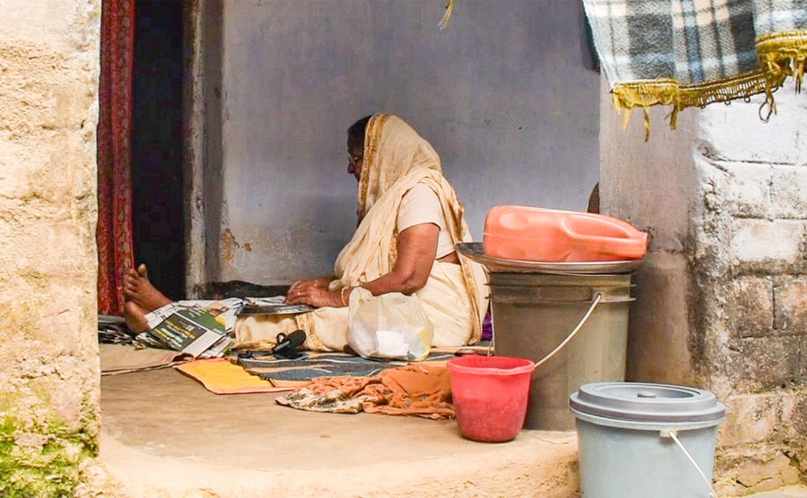 Left: Chobi Saha at work in the verandah of her house.