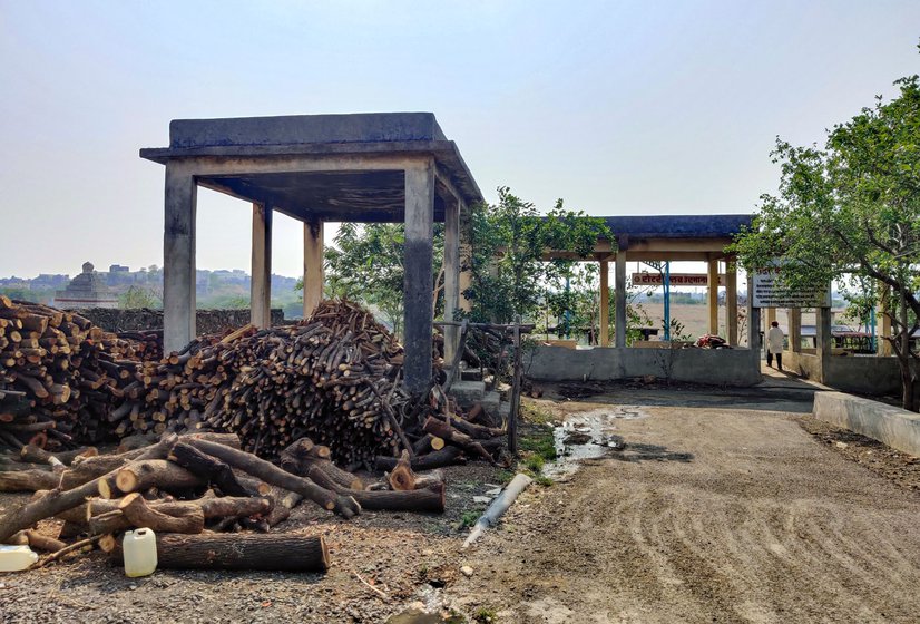 Left: Piles of wood in front of the Gandewad's home on the cremation grounds. Right: Rama Gandewad and Sarika, his three-year-old daughter