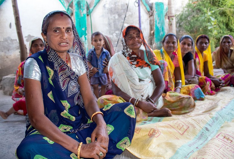 Kalpana Rawal (blue saree) is leading a women’s group in her village to promote women’s health