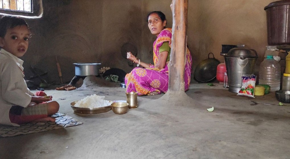 Right: Chandana Das in their kitchen with her grandson
