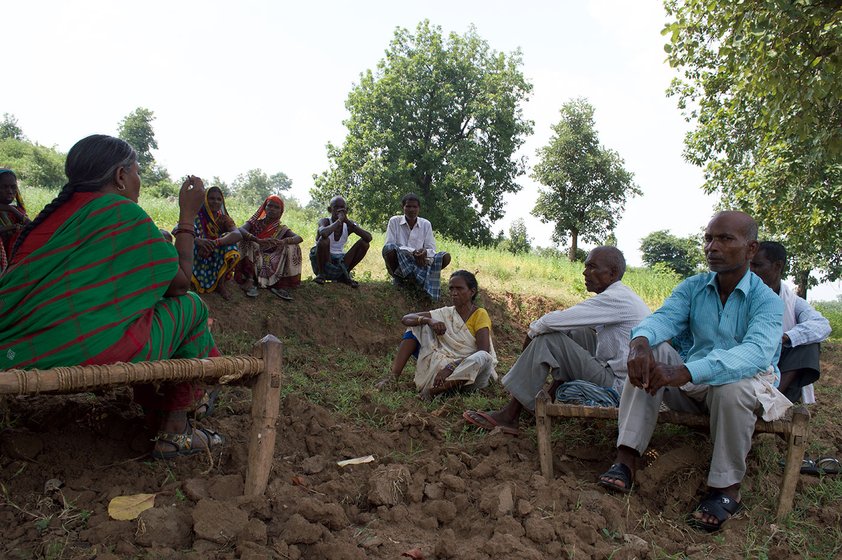 Rajkumari leads a community meeting in her village