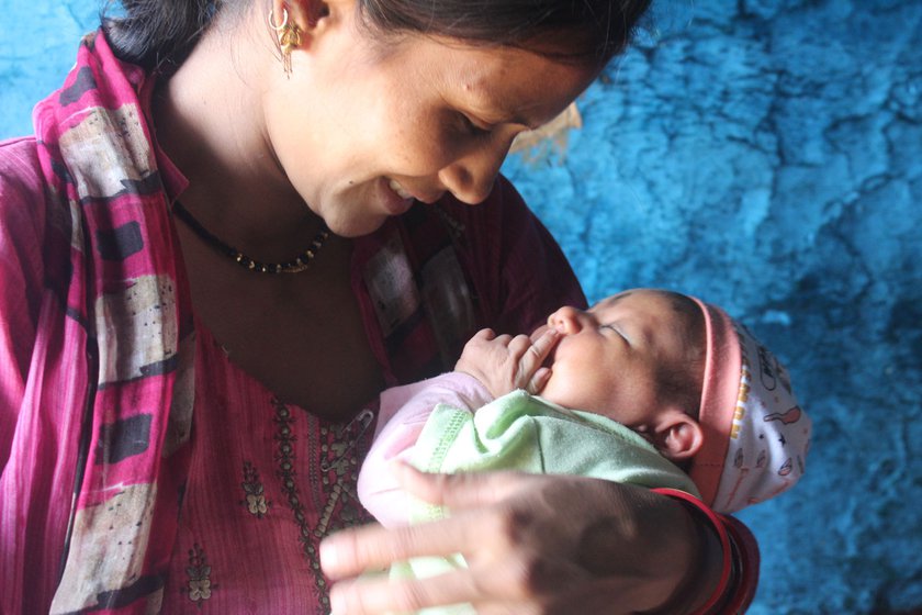 Manisha Singh Rawat gave birth to her daughter (in pram) at home, assisted by a dai or traditional birth attendant