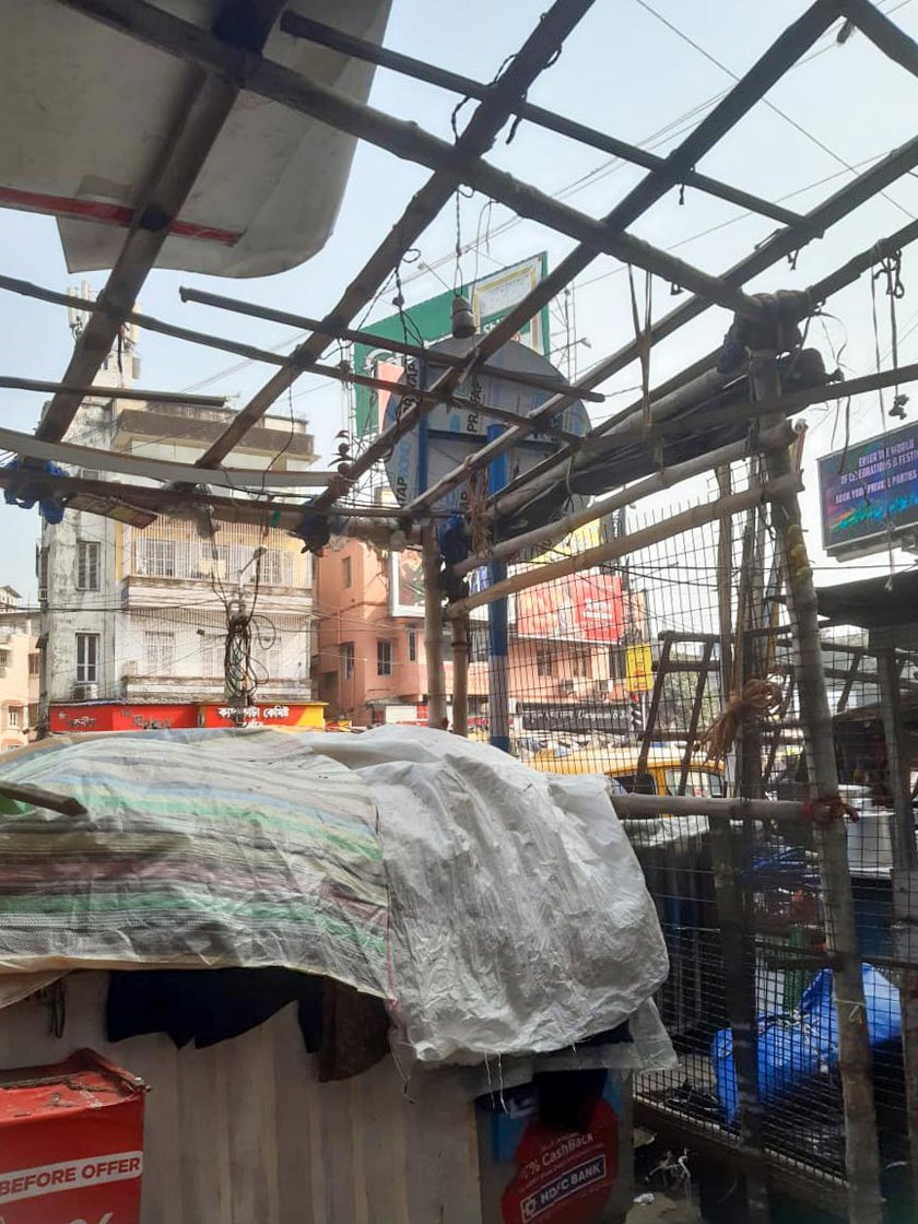 Right: Towards the end of 2022, street vendors were ordered to remove plastic sheets covering their stalls
