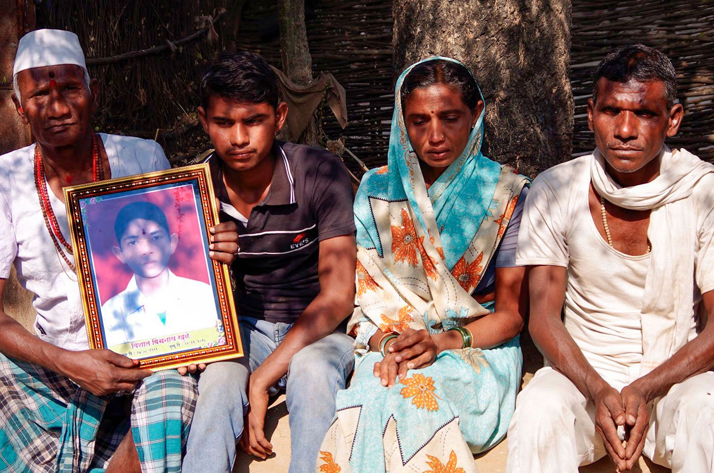 Young Vishal Khule, the son of a famer in Akola’s Dadham village, took his own life in 2015. Seen here are Vishal's father, Vishwanath Khule and his mother Sheela (on the right); elder brother Vaibhav and their neighbour Jankiram Khule with Vishal’s paternal uncle (to the left). Dadham, with a population of 1,500, is among the poorest villages in western Vidarbha, Maharashtra’s cotton and soybean belt, which has been in the news since the mid-1990s for a continuing spell of farmers’ suicides. The region is reeling under successive years of drought and an agrarian crisis that has worsened