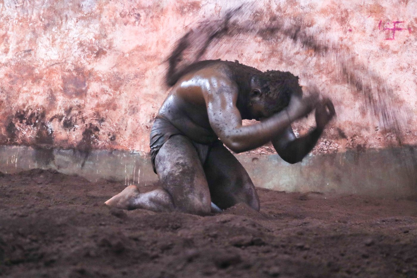 Though Juney Pargaon village's taleem is shut since March 2020, a few wrestlers continue to sometimes train inside. They first cover themselves with red soil to maintain a firm grip during the bouts