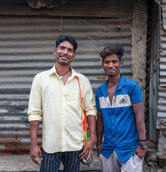 Left: Kishan with one of his younger brothers, Suraj.