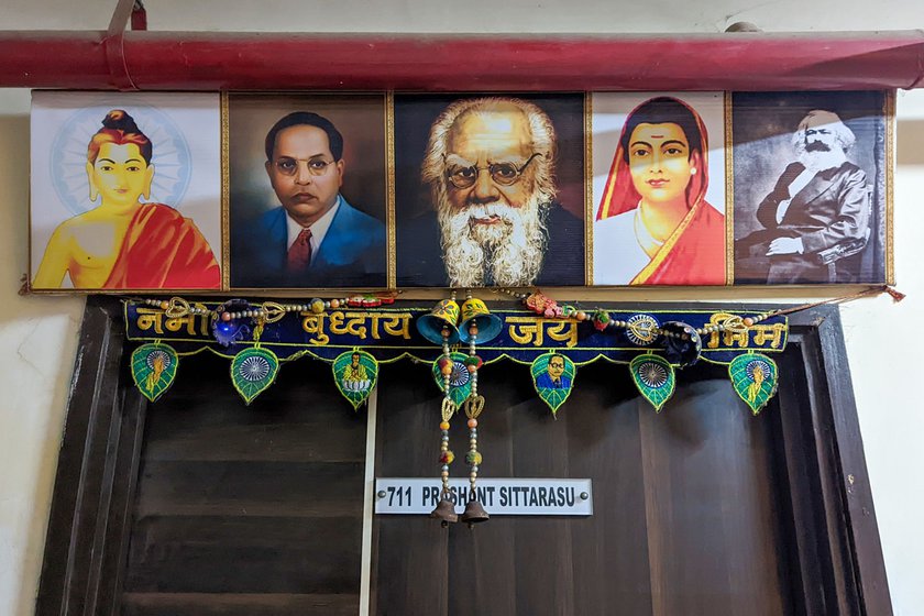 Outside Vennila’s new house (left) is a photo of Buddha, Dr. Ambedkar, Periyar E.V. Ramaswamy, Savitribhai Phule and Karl Marx . Vennila and her husband (right), and their two sons converted to Buddhism last year