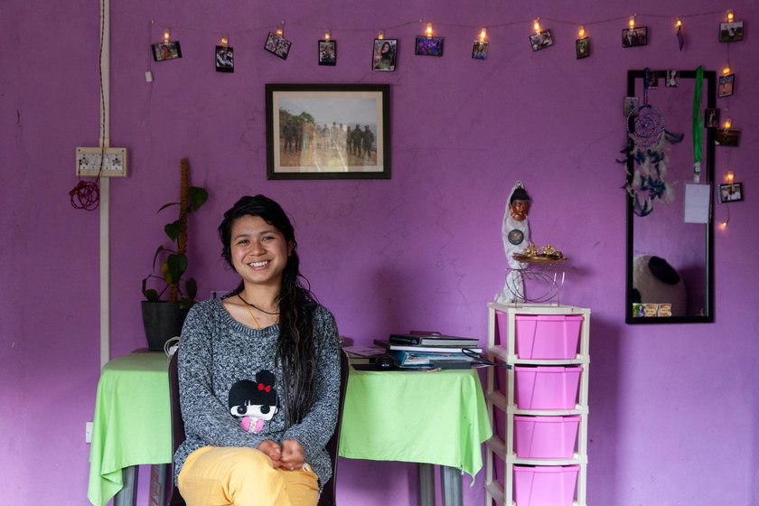 Shaleena Phinya, the first woman patrolling officer at the SBVCR, in her living room in Singchung.