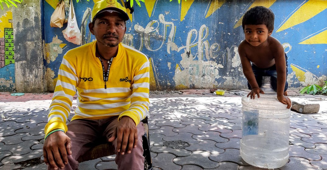 Siddharth – here, with his son Akshay – used to work at construction sites. 'That stopped when the lockdown began', he says