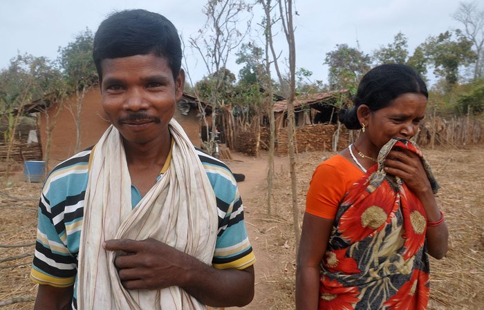 A man and a woman in front of their home in Chintalpadu village
