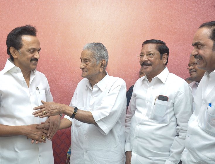 Left: DMK leader M.K. Stalin greeting Sankariah on his 98th birthday in 2019. Right: Sankariah and V.S. Achuthanandan, the last living members of the 32 who walked out of the CPI National Council meeting in 1964, being felicitated at that party’s 22nd congress in 2018 by party General Secretary Sitaram Yechury


