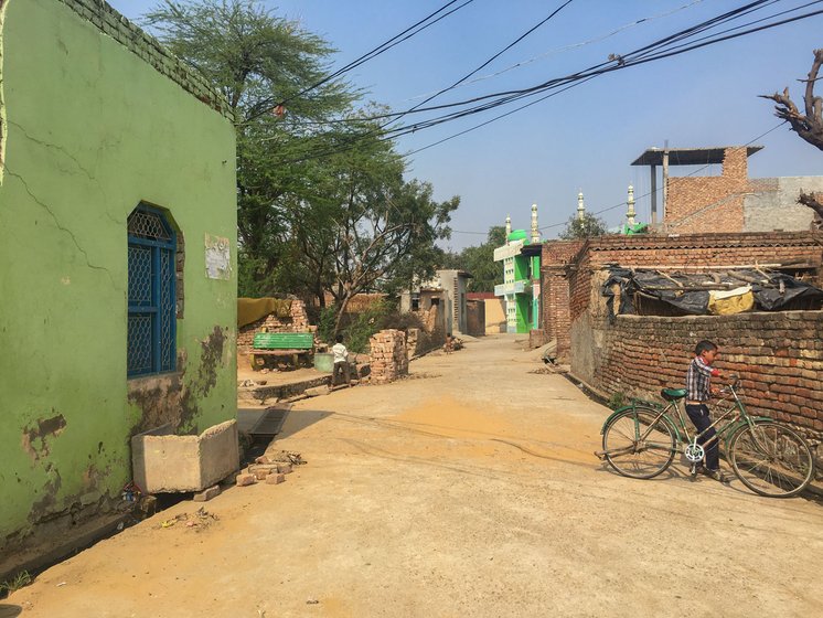 Biwan village (left) in Nuh district: The total fertility rate (TFR) in Nuh is a high 4.9. Most of the men in the village worked in the mines in the nearby Aravalli ranges (right)


