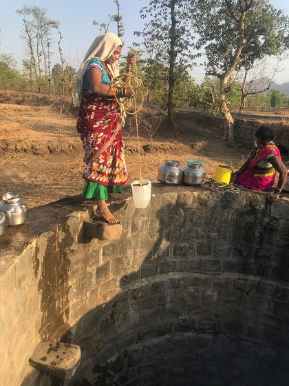 Nandini Padwale standing on the well