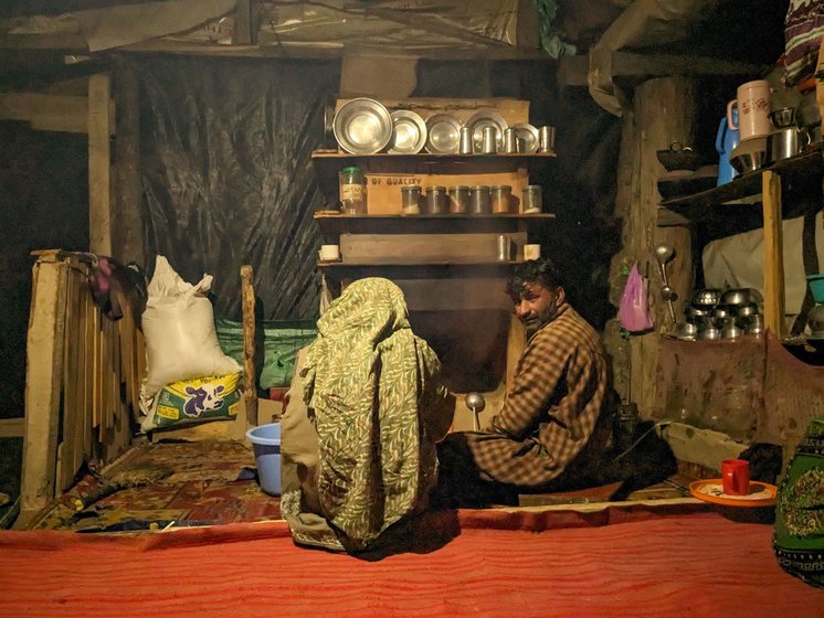 Nazir and Salima Sheikh light up the chulha (stove) and prepare for dinner inside their kotha
