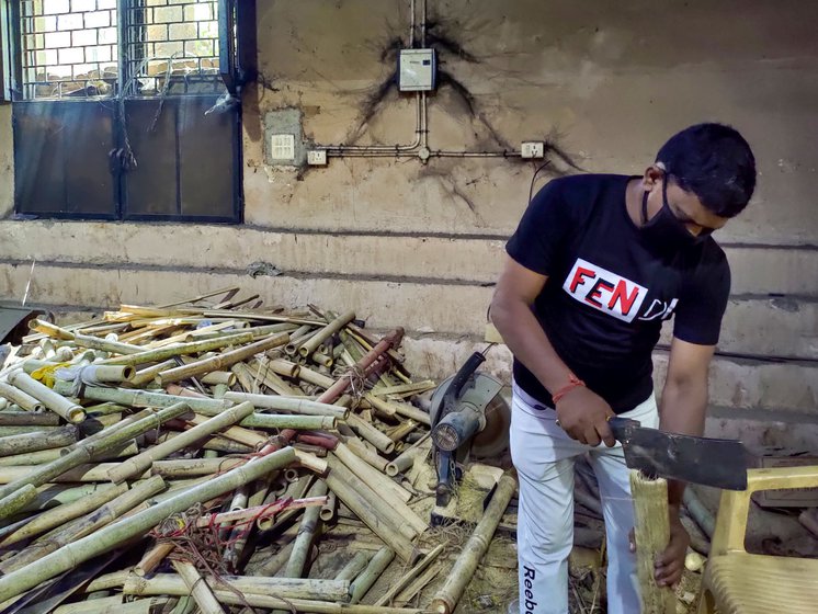 Pappu (left) cuts bamboo into pieces (right) to set up a pyre inside the CNG furnace