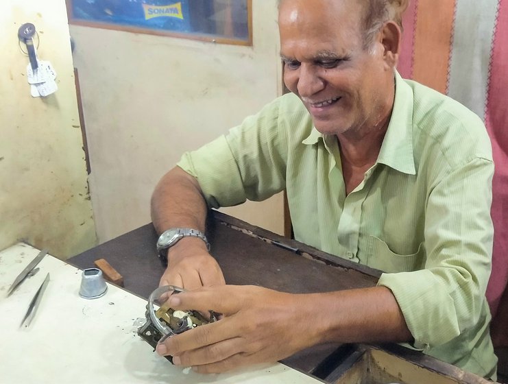 'Even before the coronavirus, I had very few watches to repair. Now it's one or two a week', says Habibur, who specialises in vintage timepieces (left) 