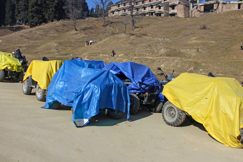 Right: With no business, many drivers have packed and covered their vehicles in plastic