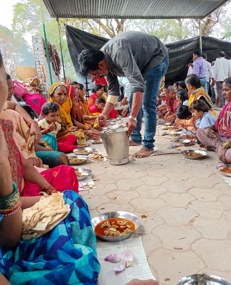 Right: Men serve the mutton dish; women eat after making hundreds of bhakri
