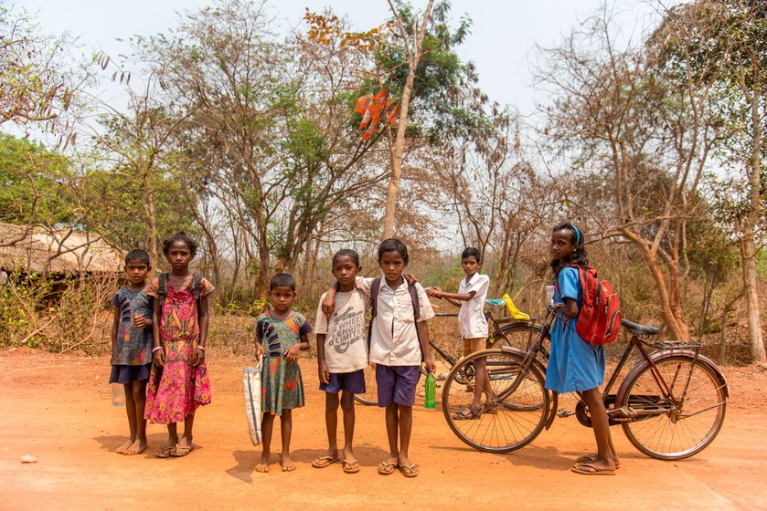 Some of the older children in Barabanki, like Jhilli Dehuri (in blue), cycle 3.5 km to their new school in Jamupasi