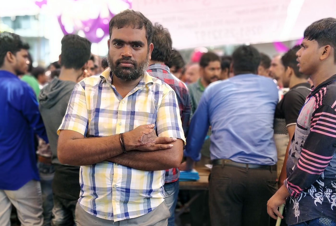 Rushikesh Rout, 38, a former powerloom unit worker lost three fingers in a freak accident in June last year. He now works as a security guard, carrying with him little hope to be compensated for his lost fingers. 