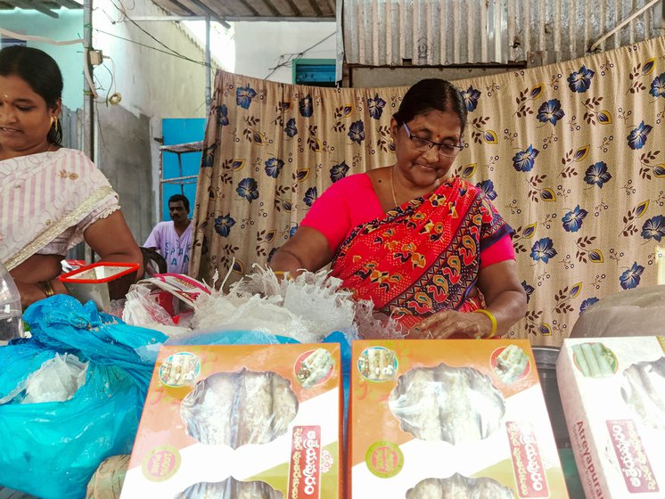 Shyamala and Sathya working at KK Nethi Pootharekulu shop in Atreyapuram