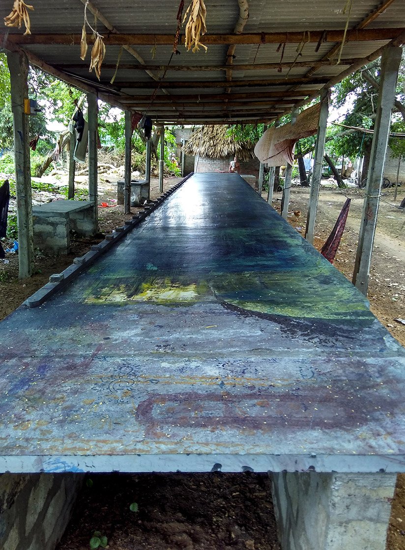 An empty Kalamkari workshed on a rainy day;  work is possible only on sunny days because drying is an important part of the block printing process
