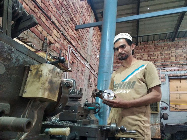 Left: Mohammad Naushad, the lathe machine technician at the factory, is in-charge of cutting and shaping the cut cylindrical iron and circular metal sheet pieces into varying weights.
