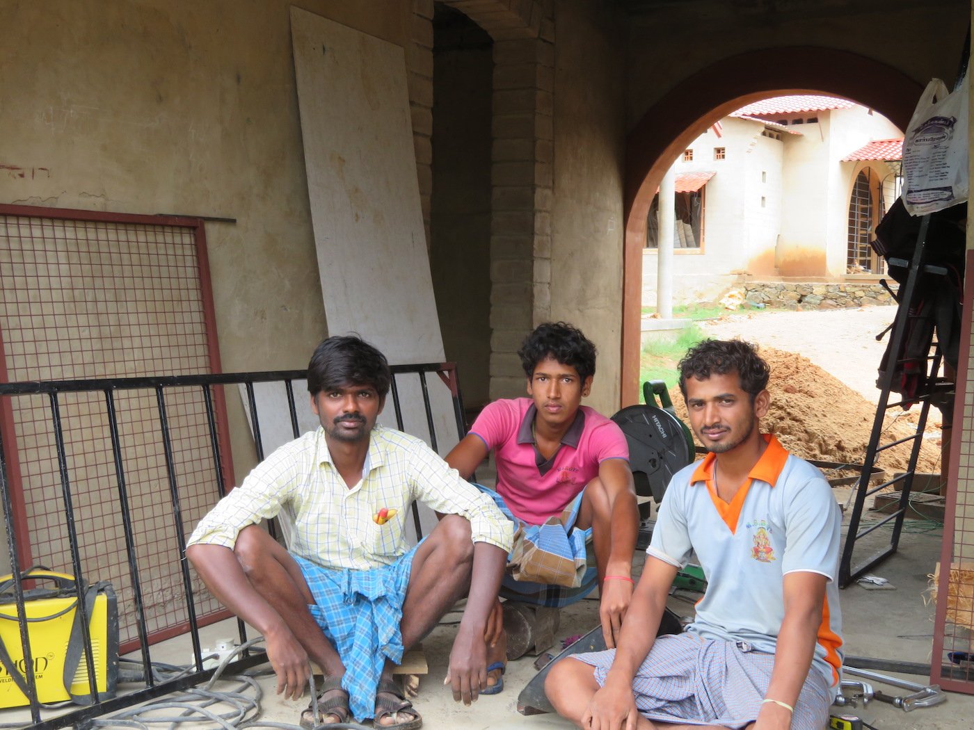 Perumal, Sriram and Kumar (left to right) building a new school campus