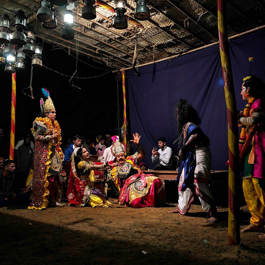 Artists are performing Dashavatar play outside the temple premises