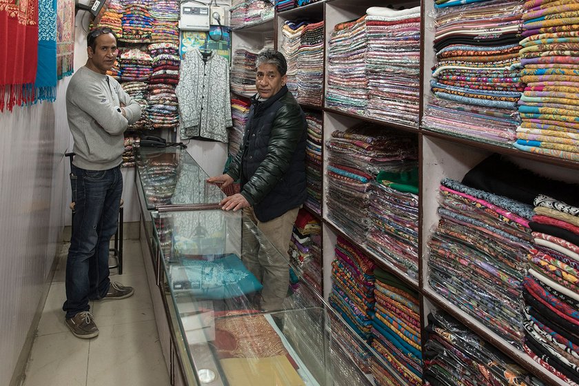 Niaz Ahmed, the owner of a pashmina shawls shop in Lal Chowk, Srinagar,  has been in pashmina trade for decades and says he has seen good times when the demand of pashmina was good as were his profits. Mashqoor Sheikh, now 44 has been in family’ pashmina business since his teens, and shifted from weaving to wholesale to try and earn more