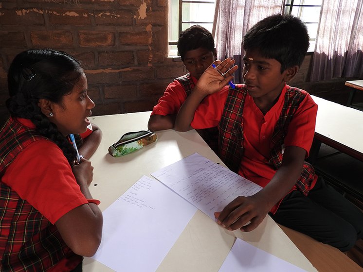 Left: Senior students, Vindhya and Aravali, are preparing the newspaper that will come out on ‘Project Day’ on November 27. During discussions with group members, they are highly focussed, jotting down important points in their neat handwriting 