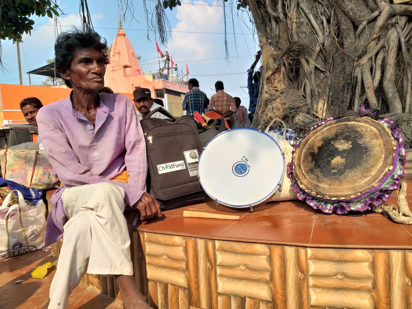 Troupes of musicians from western Odisha are gathered at the Budha Talaab square in Raipur.